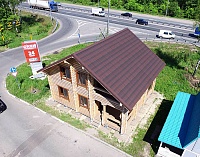 Черепица Ондулин Коричневый на крыше