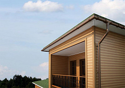 Водосточная система Альта-Профиль Коричневая на доме фото