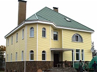 Сайдинг желтый для фасада дома