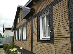 Панели Ю-Пласт Стоун-Хаус в отделке фасада дома фото