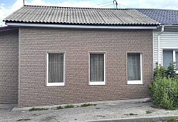 Бежевые фасадные панели Ю-Пласт под кирпичную кладку фото