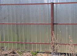 Профлист СС-10 неокрашенный на заборе фото