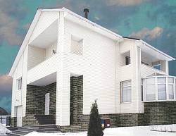 Альта-Сайдинг Белый на стене фото