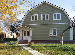 Сайдинг зеленый фасад фото