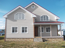 Сайдинг светло-серый на фасаде фото