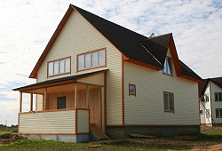 Альта-Сайдинг Кремовый на фасаде фото