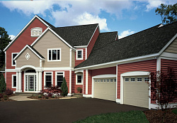 Сайдинг красно-коричневый на фасаде фото